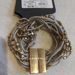 Bracelet with 18 strands. New on card.